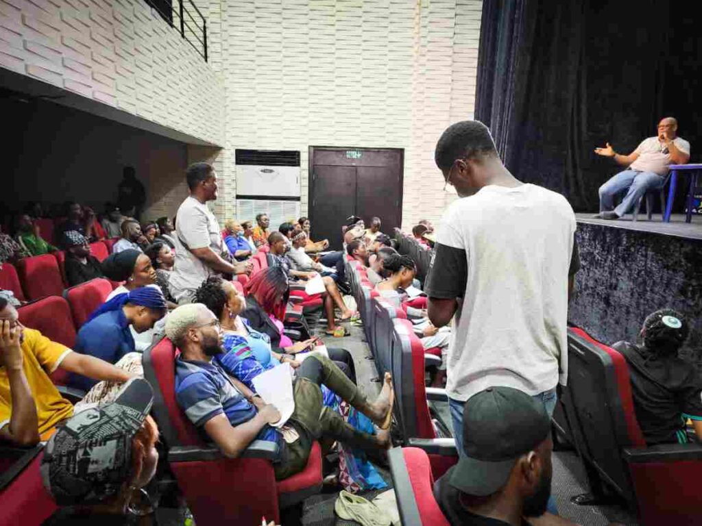 Filmmakers in a class, listening to lectures