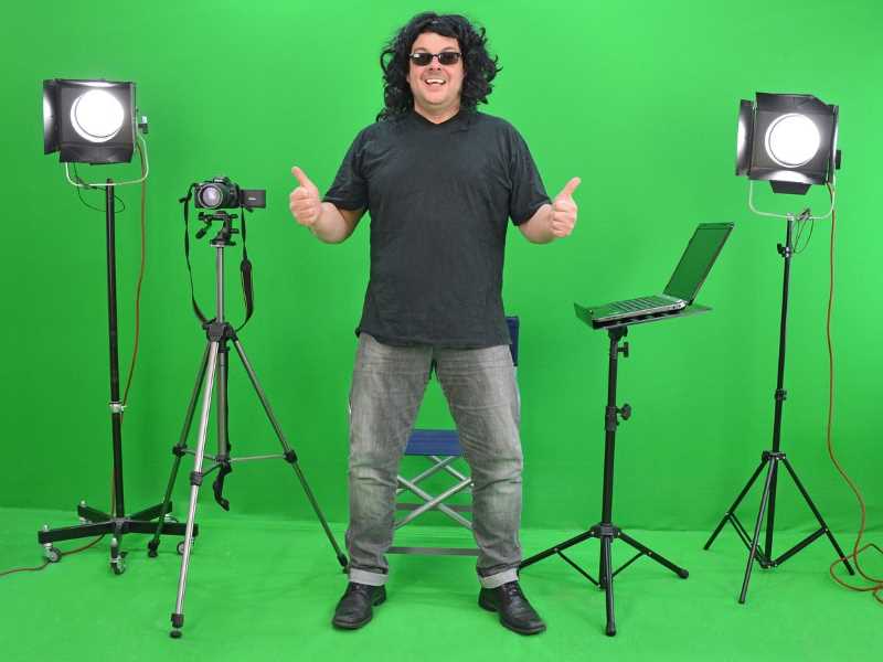 How To Create A Self-Audition Tape that gets you booked for the role. Man with lights in front of green screen. https://wakacast.com